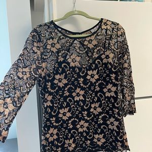 Pull over with faux cami some what stretchy